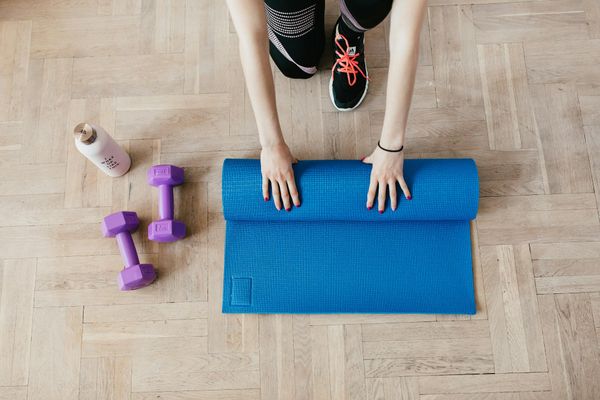 Close up of a woman performing floor exercises